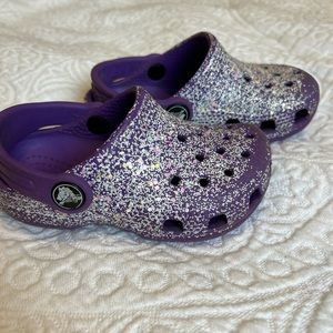 Glittery purple toddler crocs